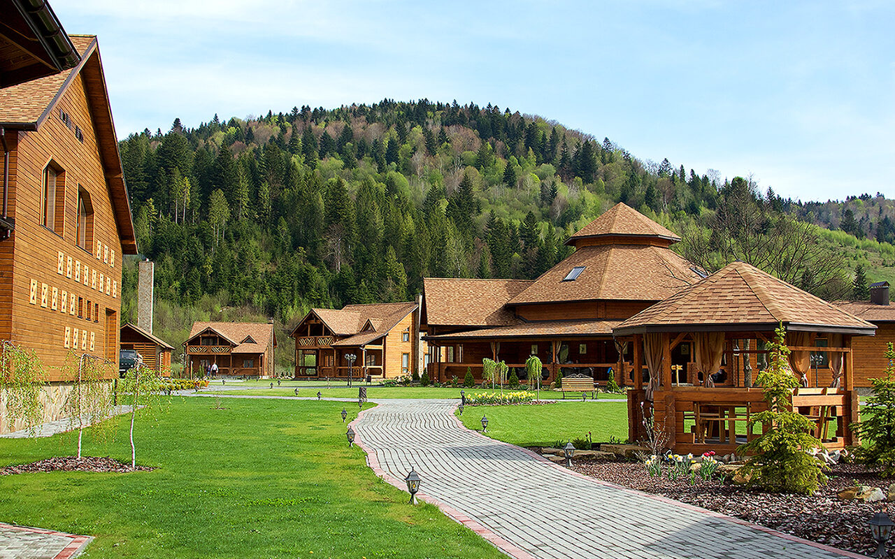 Wooden houses in the forest for vacation in the Carpathians