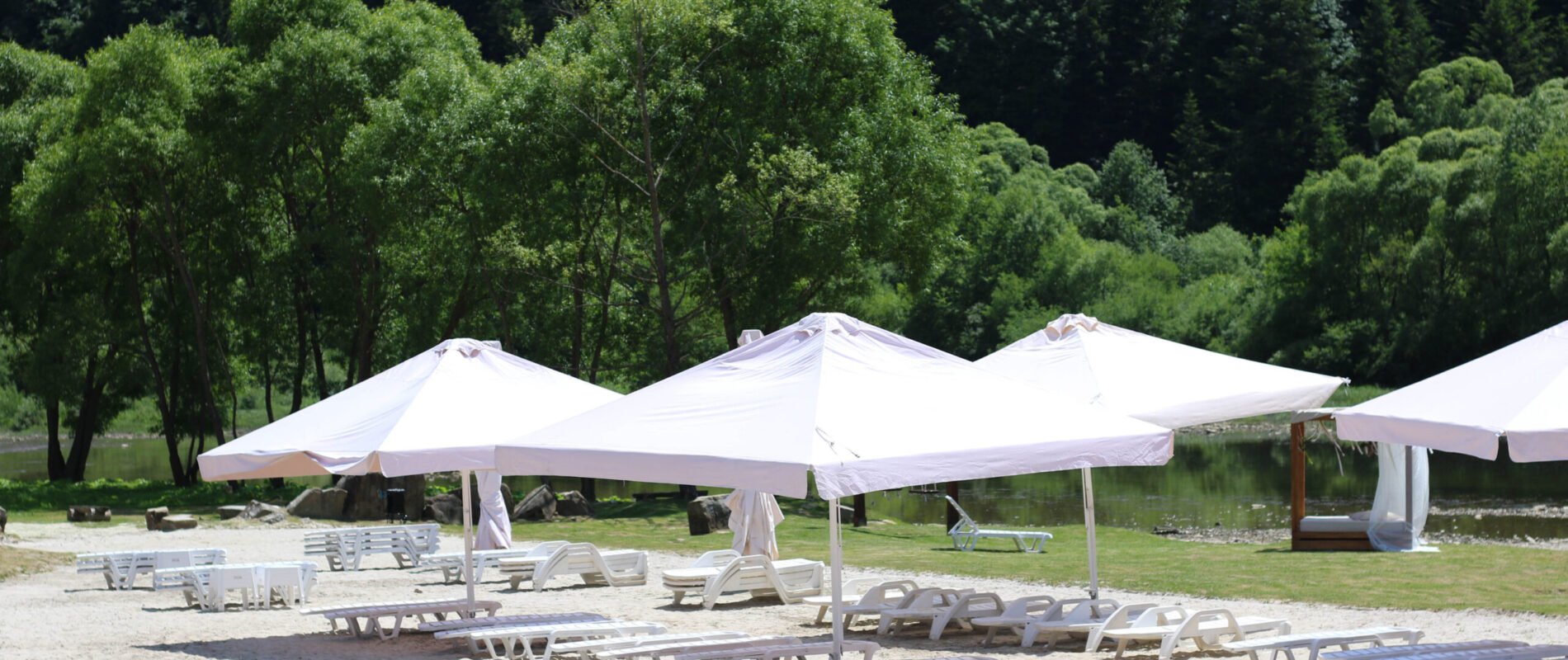 River beach and swimming pool
